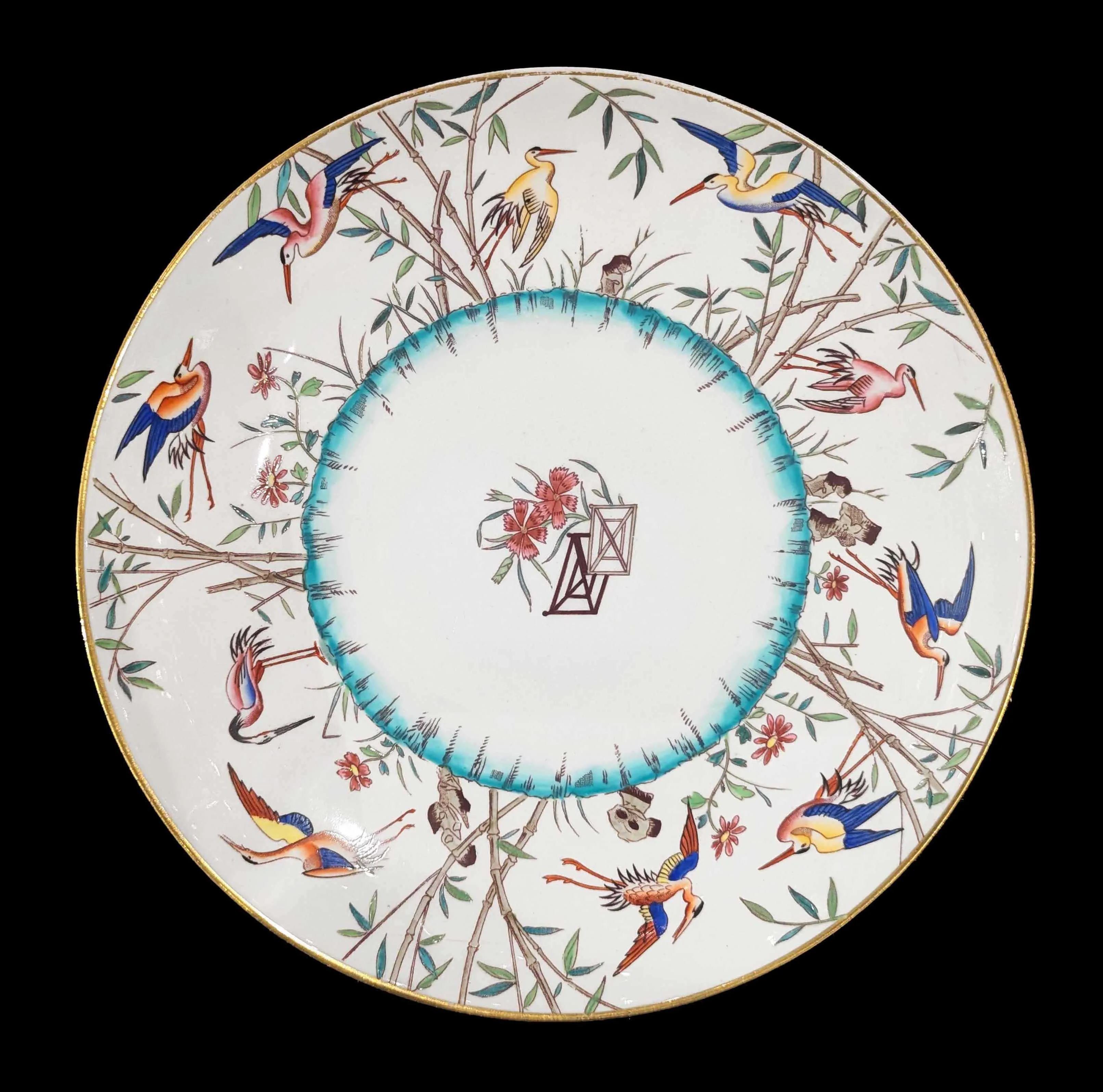 Assiette en porcelaine &agrave; d&eacute;cor de grues et bambous, manufactre de Minton, mod&egrave;le attribu&eacute; &agrave; Christopher Dresser, circa 1880