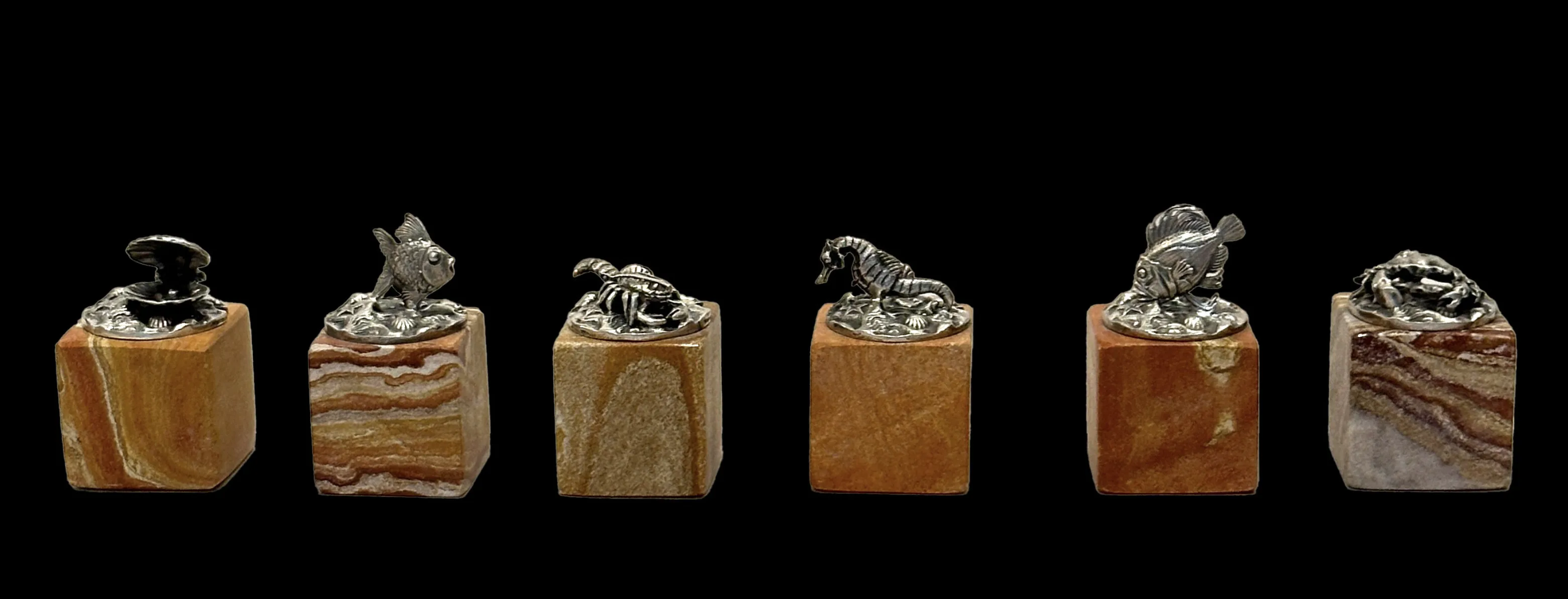 Porte nom en argent Buccellati en forme de poissons